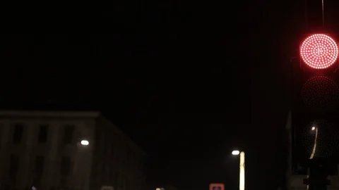 Switching traffic lights at night, red, yellow, green Stock Footage 108179345