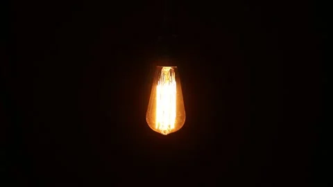 Switching on, turning off light bulb. Stock Footage 147391964