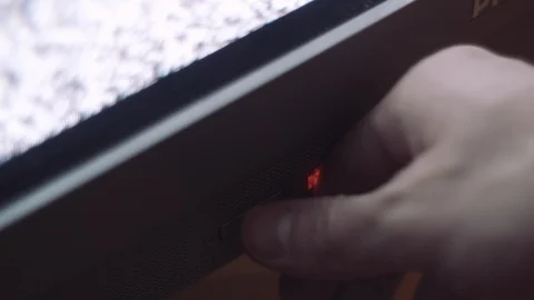 Switching off the TV, close up. Stock-Footage 88219191