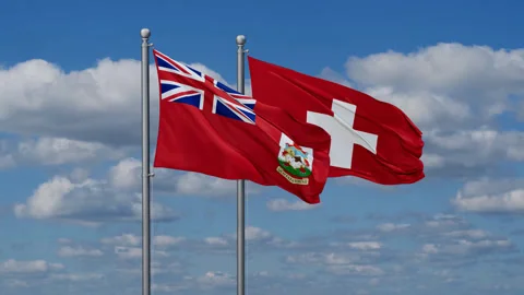 Switzerland and The Bermudas two flags Stock-Footage 288120629
