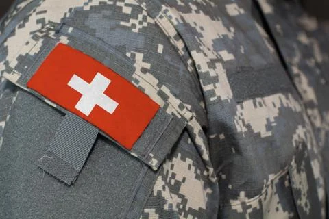 Switzerland army uniform patch flag on soldiers arm. Military Concept Stock Illustration