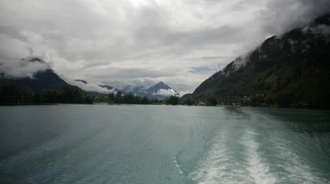 Switzerland Boat Ride On Lake with Mountains Stock Footage