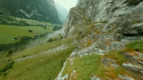 Switzerland FPV Drone Dive | Mountain Dive through Trees and Fog Stock Footage 232642828
