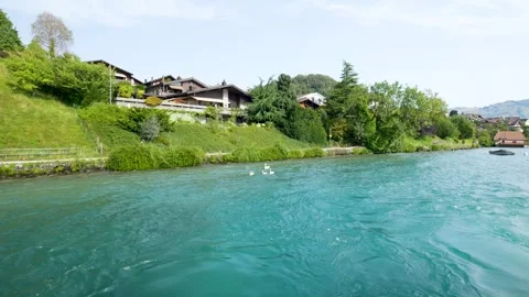 Switzerland navigating along the aare river in interlaken, switzerland Vídeos de archivo 343540498