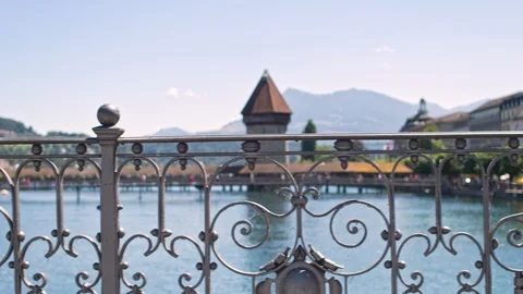 Switzerland. Patterned railings of the bridge in Lucerne and a magnificent Stock Footage 104418651