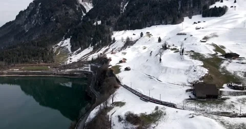 Switzerland Winter Train 4K Stock Footage 235550977
