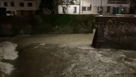 Swollen river Stockbeeldmateriaal 254812083