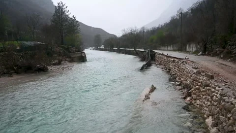 The swollen river swept away the bridge. Floods. Stock Footage 305397486