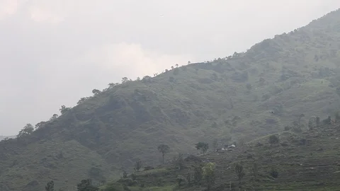 Swooping View of Himalayan Mountain and Rapids Video stock 86758101
