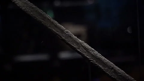 Sword. An ancient sword hangs in the Danish History Museum. Stock Footage 236346390