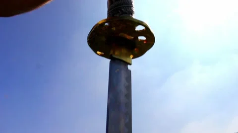 Sword being removed from sheath Stock Footage 49069436