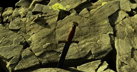 Sword embedded in rugged stone at a dramatic landscape location Stock Illustration