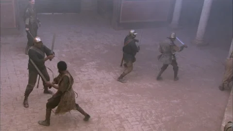 Sword fight between Romans and Vandals - Reenactment Stock Footage 202904353