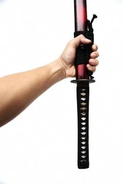 Sword - knife upside down on hand isolated in white background. Stock Photos