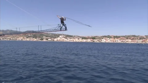 Swordfish hunter at the end of the catwalk throws the harpoon and hit the fish 스톡 동영상 79753905