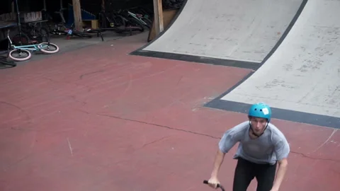 Сyclist performs a jump on the springboard Video stock 103217141