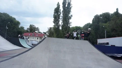 Сyclist performs trick on springboard and falls Stock-Footage 103217511