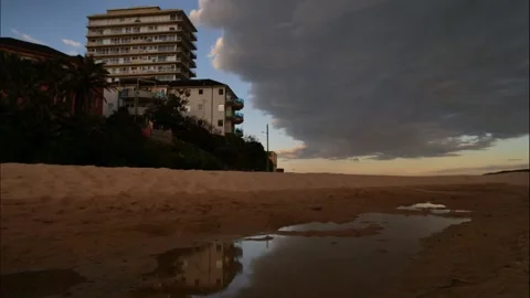 Sydney apartment block reflection at Manly time lapse dolly 4K Stock Footage 246398265
