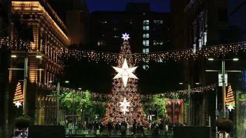 Sydney CBD Christmas tree decorated with bright lights time lapse 4k. Stock Footage 145730009