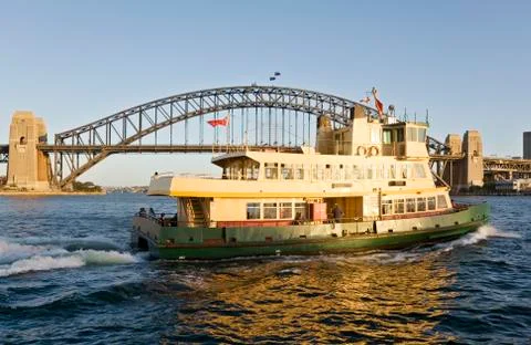 Sydney ferry and sydney harbour bridge Stock Photos