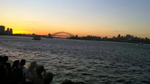 Sydney harbor bridge, UHD handheld view in a ferry towards the harbor bridge, Stock Footage 87624194