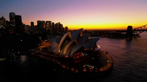 Sydney Harbour and Bridge, Opera House and outside building aerial view evening Stock Footage 156268039