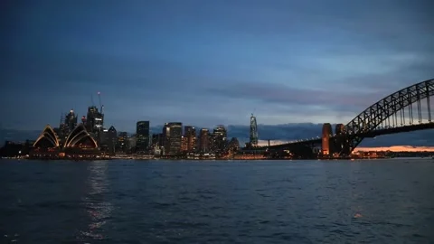Sydney harbour and bridge at sunset in 4k timelapse to dark. Stock Footage 134874608