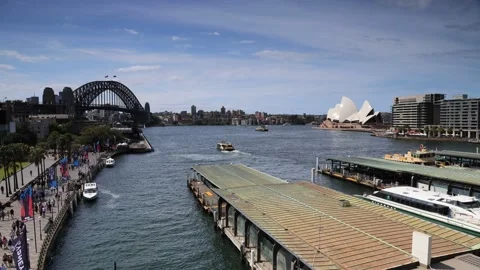 Sydney Harbour bridge and Circular Quay ferries in time lapse as 4k. Stock Footage 219585159