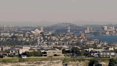 Sydney Harbour Bridge and Opera House Cityscape Viewed from the Eastern Suburbs Stock Footage 346120966