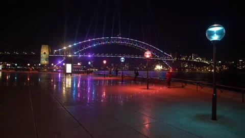 Sydney Harbour bridge reflection during Vivid festival 4K Stock Footage 165573309