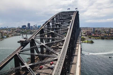 Sydney harbour with bridge structure in foreground Stock Photos
