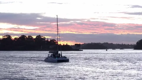 Sydney Harbour Sunset, Reflective waters, City lights, Seaside charm Stock Footage 274481727