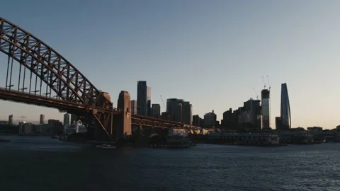 Sydney Harbour view - Tracking in to Walsh Bay at Sunset - Aerial Drone Stock Footage 235117192