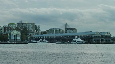 Sydney harbourside properties with Anzac bridge partly showing  4K Stock Footage 197977504