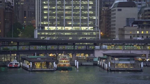 Sydney at night. Circular Quay ferry terminal in downtown Stock Footage 76535896