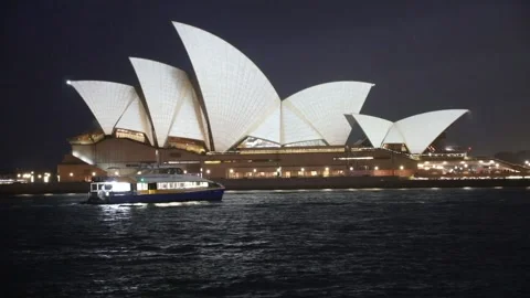 Sydney Opera House lights up with red poppies to mark Remembrance Day Stock Footage 164955950