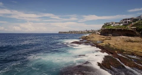 Sydney sandstone ocean beach cliffs aerial drone Stock Footage 102590069