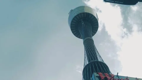 Sydney Tower Viewed from Pitt Street with Urban Skyline and Cloudy Sky Stock Footage 345730447
