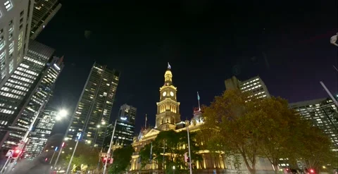 Sydney Town Hall clock tower lit up at night timelapse Stock Footage 347059585