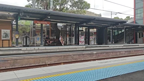 SYDNEY TRAIN STATION IN INNER WEST MARRICKVILLE AUSTRALIA ON A SUNNY DAY 4K Stock Footage 262845645