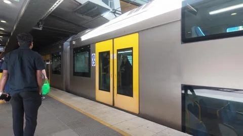 Sydney train station, passengers board and alight train Stock Footage 320847448