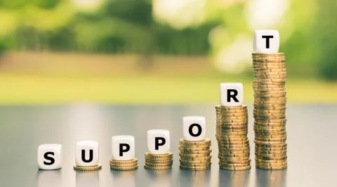 Symbol for financial support due to the corona crisis, Dice form the word "su Stock Photos