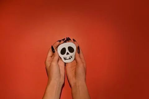 The symbol of the ghost in the hands. Stock Photos