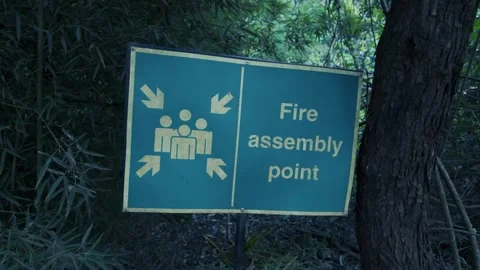 Symbol marking fire assembly point in Karura forest area in Nairobi, Kenya Stock Footage 265133702