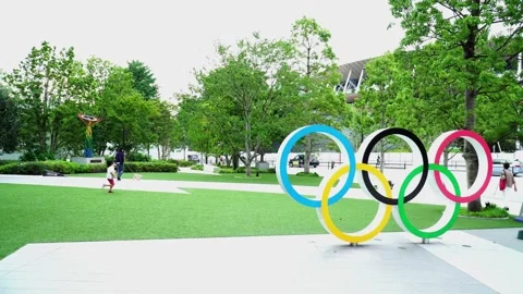 Symbol of the Olympic Games and view of the Tokyo Metropolitan National Stadium Stock Footage 134915361