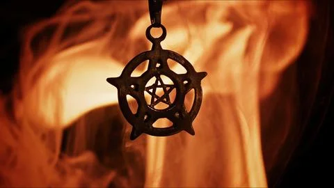 Symbol of Protection Pentagram on Fire Stock Photos