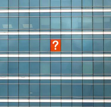 The symbol of the query mark on the building's window. Fotos de archivo