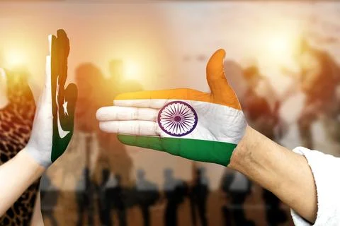 Symbolic Handshake Highlighting Unity Between India and Pakistan With Flags Stock Photos