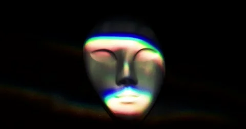 Symbolic human being face in the rays of light 스톡 동영상 244464923