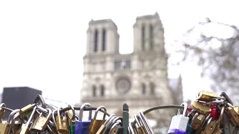 Symbolic Love Locks Framed by Notre Dame Cathedral in Paris Stock Footage 303781466